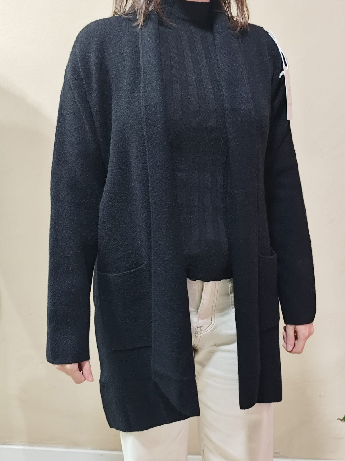 Cárdigan largo en tejido grueso con bolsillos