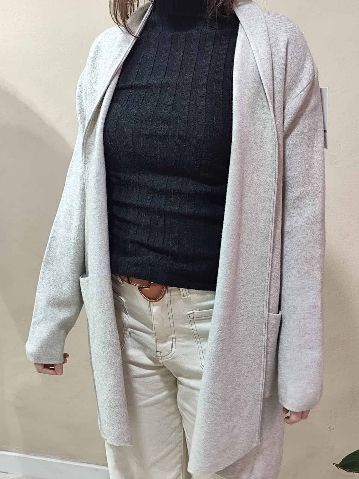 Cárdigan largo en tejido grueso con bolsillos