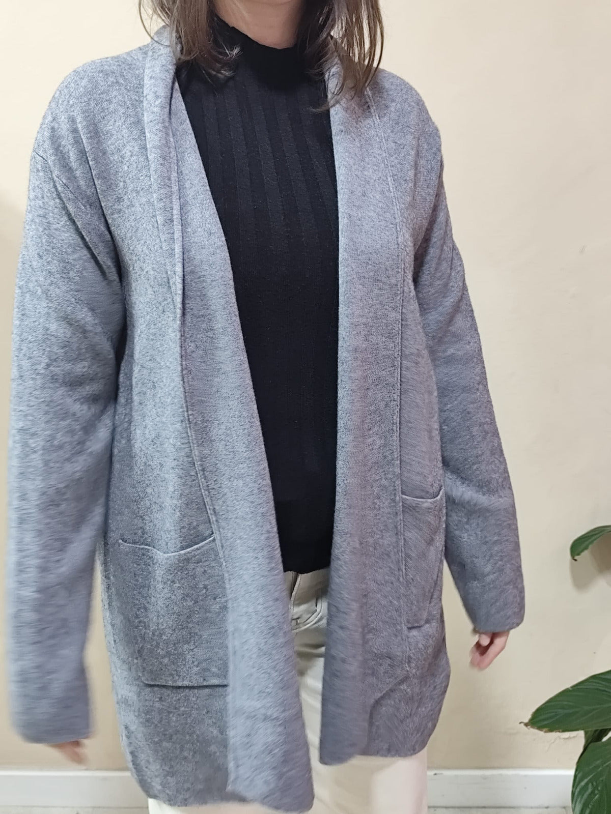 Cárdigan largo en tejido grueso con bolsillos